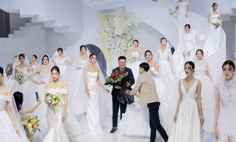 Hoa hậu Ngọc Châu diện váy cưới kết tùng bằng 100 m lụa