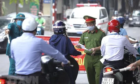 Hà Nội điều chỉnh việc kiểm tra giấy đi đường