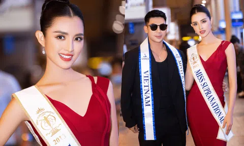 Hoa hậu Siêu quốc gia 2013 diện váy đỏ rạng rỡ khi đến Việt Nam