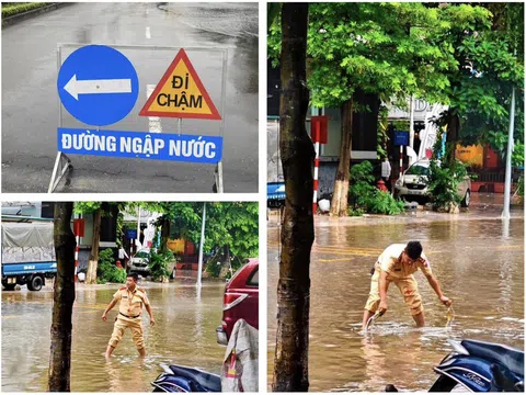 Vĩnh Phúc: CSGT TP Vĩnh Yên phân luồng giao thông tránh những tuyến phố ngập sâu, bảo đảm an toàn