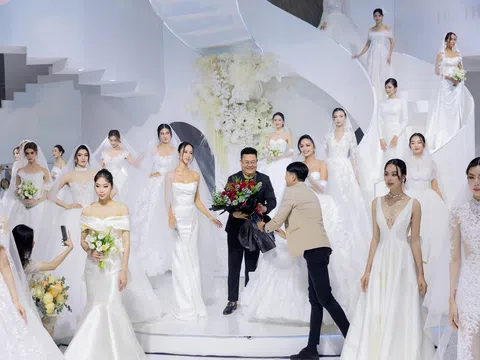 Hoa hậu Ngọc Châu diện váy cưới kết tùng bằng 100 m lụa