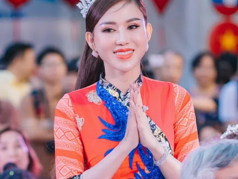 Hoa hậu Lương Thị Thùy Dung mặc áo dài tham sự Bunpimay lễ hội Tết Bunpimay Lào tại Việt Nam