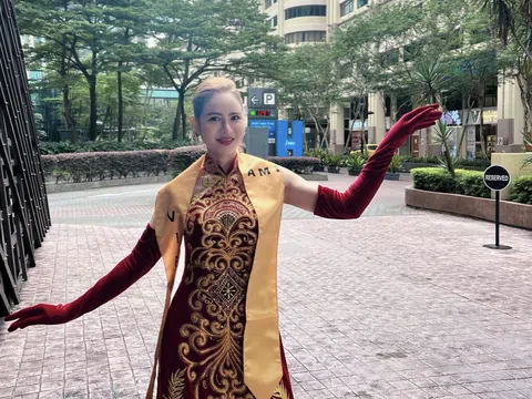 Hoa hậu Lan Lê nổi bật giữa dàn thí sinh quốc tế trong tà áo dài Việt Nam